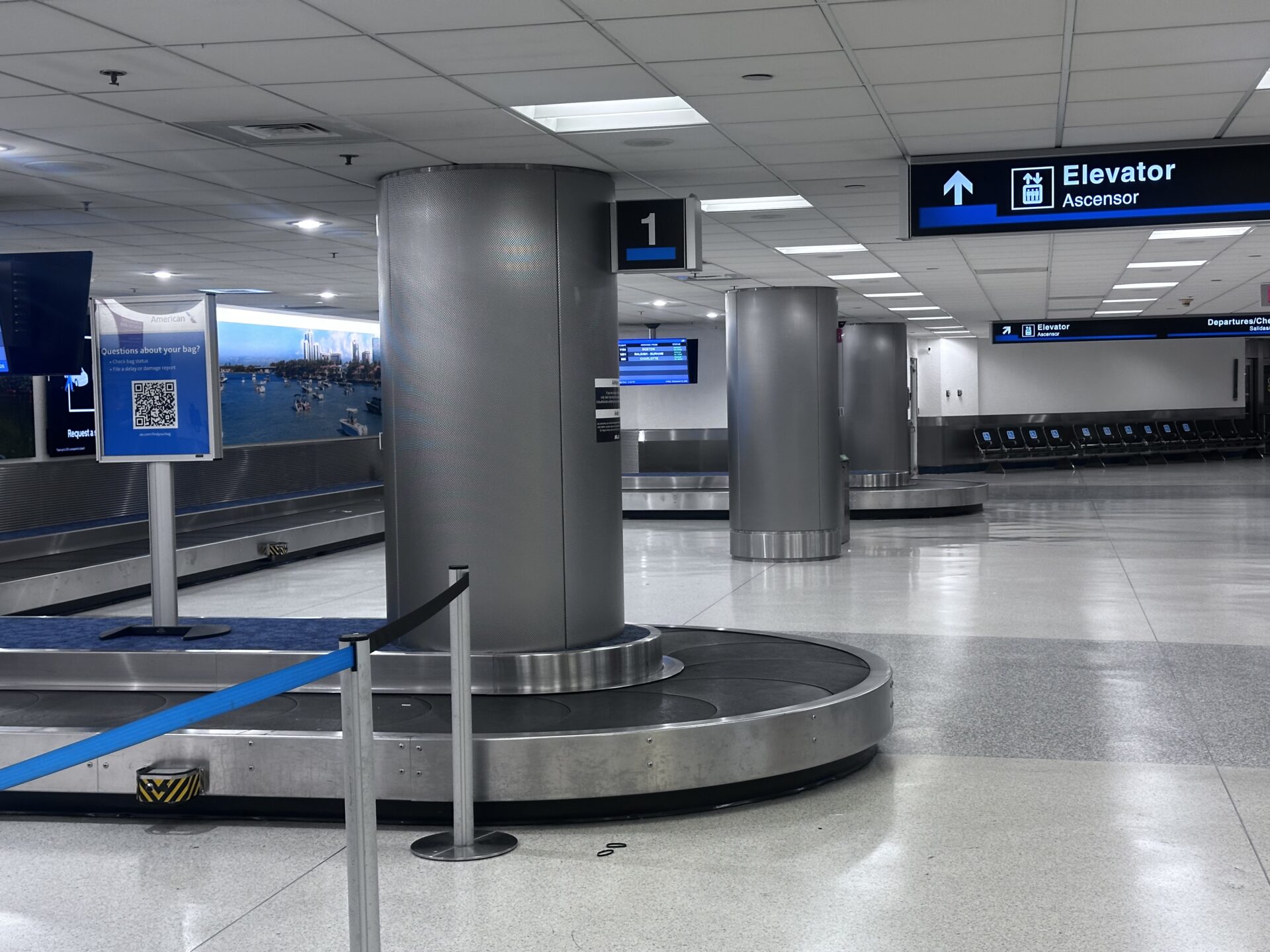 Carousel 1 sign and baggage conveyor at Miami International Airport.