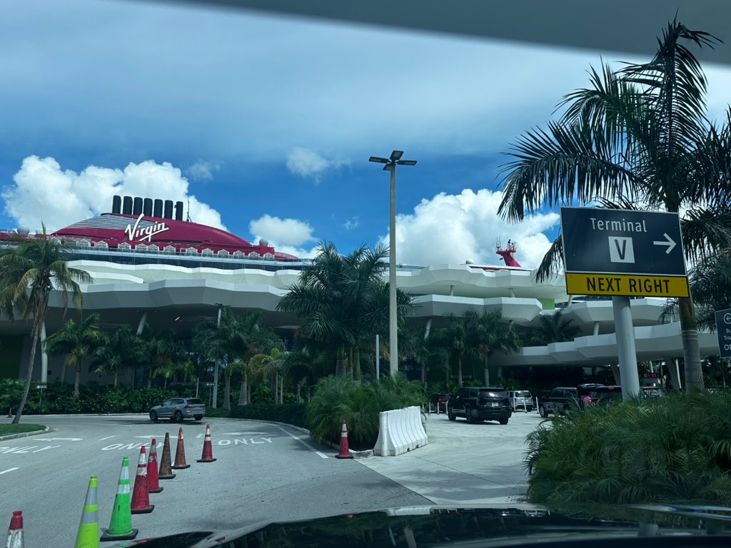 Virgin Voyages cruise ship and Terminal V entrance at PortMiami